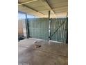 Covered back patio with open gate at 934 S Evangeline Ave, Mesa, AZ 85208