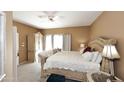 Serene main bedroom with plush carpeting, a ceiling fan, and a wardrobe for ample storage at 10218 N 12Th Pl # 2, Phoenix, AZ 85020