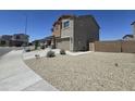 Charming two-story home with a two-car garage and neutral color scheme at 10968 W Baden St, Avondale, AZ 85323