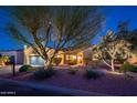 Inviting single-story home with desert landscaping and a two-car garage, perfect for a relaxed lifestyle at 22813 N Del Monte Dr, Sun City West, AZ 85375