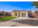 Inviting exterior showcasing a well-maintained lawn and covered entrance at 2638 E Edgemont Ave, Phoenix, AZ 85008