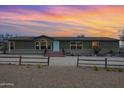 Charming single-story home with a covered entry and desert-style landscaping at 38413 N 16Th St, Phoenix, AZ 85086