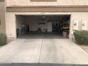 Spacious two-car garage with ample room for parking and storage at 8870 N 48Th Ln, Glendale, AZ 85302
