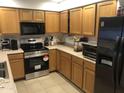 Well-equipped kitchen with stainless steel appliances and plenty of counter space at 8870 N 48Th Ln, Glendale, AZ 85302