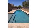 A view of the pool and patio area, perfect for outdoor entertainment and relaxation at 9302 W Georgia Ave, Glendale, AZ 85305