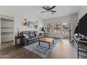 Comfortable living room featuring hardwood floors and a view of the front porch at 345 N Madison St, Wickenburg, AZ 85390