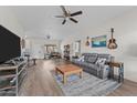 Spacious open concept living room layout with neutral walls and wood-look floors at 345 N Madison St, Wickenburg, AZ 85390