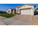 Attractive home with a paved driveway and well-kept lawn at 4834 S Meteor --, Mesa, AZ 85212