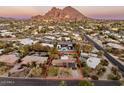 Wide aerial view showing the property with a mountain view in the background at 5507 N Calle Del Santo --, Phoenix, AZ 85018