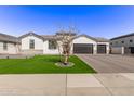 Attractive single-Gathering home with a manicured lawn and a spacious three-car garage, perfect for a growing Gathering at 1294 E La Fortuna Ct, San Tan Valley, AZ 85140