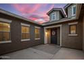 Inviting front entrance with cozy private courtyard and stylish front door at 20040 E Kestrel St, Queen Creek, AZ 85142