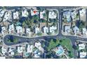 Aerial view of neighborhood showcasing single story home with mature trees at 527 E Tam Oshanter Dr, Phoenix, AZ 85022