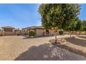 Long brick driveway showing a home with well-maintained landscaping at 7215 W Union Hills Dr, Glendale, AZ 85308