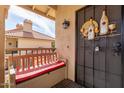 Relaxing outdoor balcony with comfortable seating and charming decor, perfect for enjoying the surrounding views at 9711 E Mountain View Rd # 2524, Scottsdale, AZ 85258