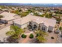 Expansive aerial view showcasing the home's tiled roof, desert landscaping, and the surrounding community at 15803 E Tumbleweed Dr, Fountain Hills, AZ 85268