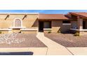 Inviting single-story home with a well-maintained walkway leading to the entrance at 20421 N 3Rd Dr # 2, Phoenix, AZ 85027