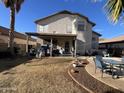 View of the home's backyard and patio with room for entertaining at 3851 E San Pedro Ave, Gilbert, AZ 85234