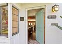 Welcoming entryway with an open door showcasing the home's interior at 1129 W Holly St, Phoenix, AZ 85007