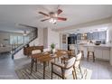Bright dining area flows into the kitchen, featuring a modern table and seating for four at 3823 N 28Th St, Phoenix, AZ 85016
