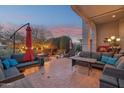 Spacious outdoor patio with comfortable seating, perfect for entertaining and enjoying scenic views at sunset at 15510 E Sycamore Dr, Fountain Hills, AZ 85268