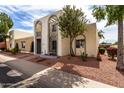 Charming home exterior featuring desert landscaping and a unique architectural style at 1725 W Marlette Ave, Phoenix, AZ 85015