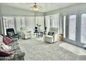 Bright and airy living room with comfortable seating and lots of natural light at 328 E Aztec Blvd, Mesa, AZ 85205