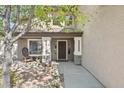 Inviting front porch with comfortable seating and decorative flower pots at 3336 E Linda Ct, Gilbert, AZ 85234