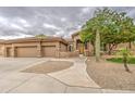 Beautiful single-story home with a stone pathway and mature landscaping at 4417 W Lawler Loop, Phoenix, AZ 85083