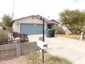 Charming single-story home with a xeriscaped front yard and a two-car garage at 8846 N 3Rd St, Phoenix, AZ 85020