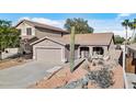 Lovely single-story home with desert landscaping, offering a serene curb appeal at 15853 S 17Th Dr, Phoenix, AZ 85045