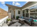 Inviting outdoor patio with comfortable seating and a cozy fire pit, perfect for relaxation at 20718 W Colter St, Buckeye, AZ 85396