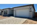 Charming single-story home with a neutral color scheme and a spacious two-car garage at 22685 E Saddle Way, Queen Creek, AZ 85142