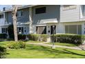 Townhouse complex showcases well-maintained lawns, landscaping and pedestrian walkways at 2551 W Berridge Ln # D6, Phoenix, AZ 85017