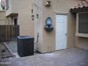 Enclosed patio with beautiful water feature and tiled entrance, offering a private outdoor retreat at 5704 E Aire Libre Ave # 1036, Scottsdale, AZ 85254