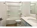 Bathroom featuring a shower-tub combo, white vanity, and modern fixtures at 7701 W Avenida Del Rey --, Peoria, AZ 85383