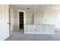 Spacious living room featuring high ceilings, neutral walls, and open floor plan providing a customizable space at 7701 W Avenida Del Rey --, Peoria, AZ 85383