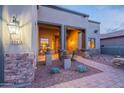 Cozy front porch area with desert landscaping at 8541 E Canyon Estates Cir, Gold Canyon, AZ 85118