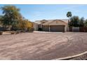 Inviting home with a spacious circular driveway and attached two-car garage in a sunny setting at 10127 W Avenida Del Sol --, Peoria, AZ 85383