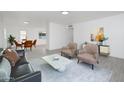 Bright living room with modern decor, neutral tones, and a sleek, contemporary design at 1909 N 74Th St, Scottsdale, AZ 85257