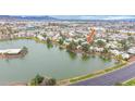 Beautiful aerial view of lakeside apartments with scenic mountain backdrop and lush green landscape at 2714 W Desert Cove Ave, Phoenix, AZ 85029