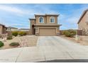 Charming two-story home with a two-car garage and low-maintenance landscaping at 284 N 199Th Dr, Buckeye, AZ 85326