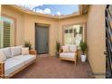 Inviting private courtyard with outdoor seating, offering a relaxing space for residents and guests at 32297 N 133Rd Ln, Peoria, AZ 85383