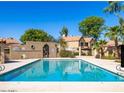 Community pool area, ideal for recreation and enjoying the outdoors at 4601 N 102Nd Ave # 1036, Phoenix, AZ 85037