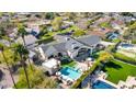 Aerial view of this home, highlighting a pool, cabana, and outdoor seating at 6114 E Calle Del Norte --, Scottsdale, AZ 85251