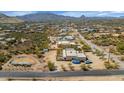 Scenic aerial view of home with horse property in a desert community at 1345 E Gaffney Rd, New River, AZ 85087