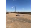 A desert road with a pile of rocks at 28003 N Faded Creek Dr, Florence, AZ 85132