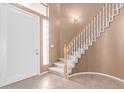 Entry with staircase and neutral walls at 8219 E Tesoro Cir, Mesa, AZ 85207