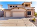 Three car garage and wide driveway at 8219 E Tesoro Cir, Mesa, AZ 85207