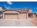 Spacious three car garage and driveway provide ample parking with beautiful desert landscaping at 1202 W Central Ave, Coolidge, AZ 85128