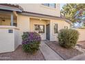 Charming townhouse entrance with a well-manicured garden, enhancing curb appeal at 1222 W Baseline Rd # 116, Tempe, AZ 85283